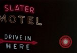 Image of neon signs of casinos and motels Las Vegas Nevada USA, 1958, second 1 stock footage video 65675072077