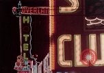 Image of neon signs of casinos and motels Las Vegas Nevada USA, 1958, second 16 stock footage video 65675072077