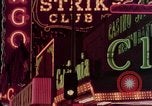 Image of neon signs of casinos and motels Las Vegas Nevada USA, 1958, second 18 stock footage video 65675072077