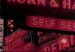 Image of neon signs of casinos and motels Las Vegas Nevada USA, 1958, second 24 stock footage video 65675072077