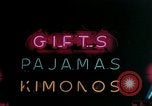Image of neon signs United States USA, 1958, second 10 stock footage video 65675072078