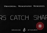Image of fisherman Bermuda Island, 1933, second 10 stock footage video 65675072240