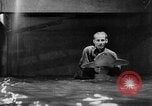 Image of fisherman Bermuda Island, 1933, second 62 stock footage video 65675072240