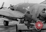 Image of loading airplane with movies for troops overseas New York United States USA, 1943, second 11 stock footage video 65675072285