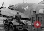 Image of loading airplane with movies for troops overseas New York United States USA, 1943, second 13 stock footage video 65675072285