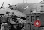 Image of loading airplane with movies for troops overseas New York United States USA, 1943, second 14 stock footage video 65675072285