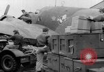Image of loading airplane with movies for troops overseas New York United States USA, 1943, second 15 stock footage video 65675072285