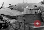 Image of loading airplane with movies for troops overseas New York United States USA, 1943, second 16 stock footage video 65675072285