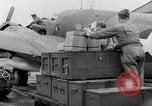Image of loading airplane with movies for troops overseas New York United States USA, 1943, second 17 stock footage video 65675072285