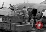 Image of loading airplane with movies for troops overseas New York United States USA, 1943, second 20 stock footage video 65675072285
