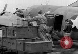 Image of loading airplane with movies for troops overseas New York United States USA, 1943, second 22 stock footage video 65675072285