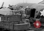 Image of loading airplane with movies for troops overseas New York United States USA, 1943, second 23 stock footage video 65675072285