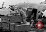 Image of loading airplane with movies for troops overseas New York United States USA, 1943, second 24 stock footage video 65675072285