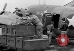 Image of loading airplane with movies for troops overseas New York United States USA, 1943, second 25 stock footage video 65675072285