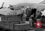 Image of loading airplane with movies for troops overseas New York United States USA, 1943, second 28 stock footage video 65675072285