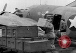 Image of loading airplane with movies for troops overseas New York United States USA, 1943, second 33 stock footage video 65675072285