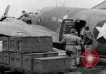 Image of loading airplane with movies for troops overseas New York United States USA, 1943, second 35 stock footage video 65675072285