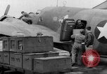 Image of loading airplane with movies for troops overseas New York United States USA, 1943, second 37 stock footage video 65675072285