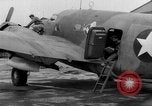 Image of loading airplane with movies for troops overseas New York United States USA, 1943, second 49 stock footage video 65675072285