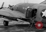 Image of loading airplane with movies for troops overseas New York United States USA, 1943, second 52 stock footage video 65675072285