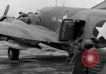 Image of loading airplane with movies for troops overseas New York United States USA, 1943, second 57 stock footage video 65675072285