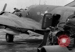 Image of loading airplane with movies for troops overseas New York United States USA, 1943, second 58 stock footage video 65675072285