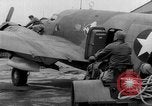 Image of loading airplane with movies for troops overseas New York United States USA, 1943, second 59 stock footage video 65675072285