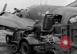 Image of loading airplane with movies for troops overseas New York United States USA, 1943, second 61 stock footage video 65675072285