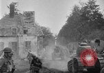 Image of U.S. Infantry and French FT-17 tanks advancing in World War 1 Western Front, 1918, second 25 stock footage video 65675072379