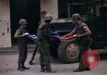Image of U.S.  Marines on Ontos antitank vehicle and M48 tank Hue Vietnam, 1968, second 4 stock footage video 65675072392