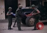 Image of U.S.  Marines on Ontos antitank vehicle and M48 tank Hue Vietnam, 1968, second 5 stock footage video 65675072392