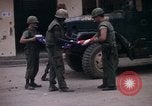 Image of U.S.  Marines on Ontos antitank vehicle and M48 tank Hue Vietnam, 1968, second 8 stock footage video 65675072392