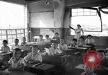 Image of school children in Hiroshima after atomic bomb Hiroshima Japan, 1946, second 3 stock footage video 65675072452