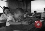 Image of school children in Hiroshima after atomic bomb Hiroshima Japan, 1946, second 28 stock footage video 65675072452