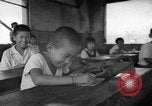Image of school children in Hiroshima after atomic bomb Hiroshima Japan, 1946, second 29 stock footage video 65675072452