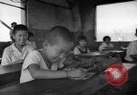 Image of school children in Hiroshima after atomic bomb Hiroshima Japan, 1946, second 31 stock footage video 65675072452