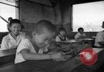 Image of school children in Hiroshima after atomic bomb Hiroshima Japan, 1946, second 32 stock footage video 65675072452