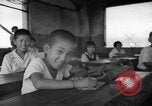 Image of school children in Hiroshima after atomic bomb Hiroshima Japan, 1946, second 33 stock footage video 65675072452