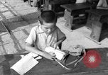 Image of school children in Hiroshima after atomic bomb Hiroshima Japan, 1946, second 49 stock footage video 65675072452