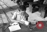 Image of school children in Hiroshima after atomic bomb Hiroshima Japan, 1946, second 50 stock footage video 65675072452