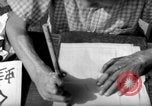 Image of school children in Hiroshima after atomic bomb Hiroshima Japan, 1946, second 52 stock footage video 65675072452