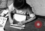 Image of school children in Hiroshima after atomic bomb Hiroshima Japan, 1946, second 58 stock footage video 65675072452