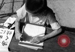 Image of school children in Hiroshima after atomic bomb Hiroshima Japan, 1946, second 59 stock footage video 65675072452