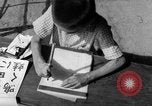 Image of school children in Hiroshima after atomic bomb Hiroshima Japan, 1946, second 60 stock footage video 65675072452