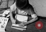Image of school children in Hiroshima after atomic bomb Hiroshima Japan, 1946, second 61 stock footage video 65675072452