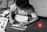 Image of school children in Hiroshima after atomic bomb Hiroshima Japan, 1946, second 62 stock footage video 65675072452