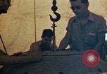 Image of Final arming of first nuclear bomb for Trinity nuclear test Alamogordo New Mexico USA, 1945, second 49 stock footage video 65675072462