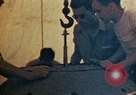Image of Final arming of first nuclear bomb for Trinity nuclear test Alamogordo New Mexico USA, 1945, second 50 stock footage video 65675072462