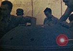 Image of Final arming of first nuclear bomb for Trinity nuclear test Alamogordo New Mexico USA, 1945, second 59 stock footage video 65675072462