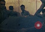 Image of Final arming of first nuclear bomb for Trinity nuclear test Alamogordo New Mexico USA, 1945, second 60 stock footage video 65675072462